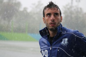 Peter sporting the Racing training kit under the pouring rain. Photo Credits: Marina Nasr