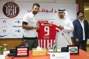 Mirko Vucinic signs for Al-Jazira. (Photo Credits: thenational.ae)