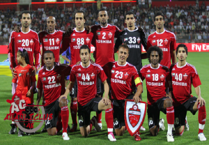 Ali Karimi with Al-Ahli (#88).